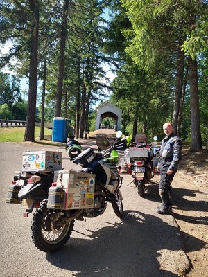 Stefan and our
        motorcycles in front of a covered bridge in Oregon